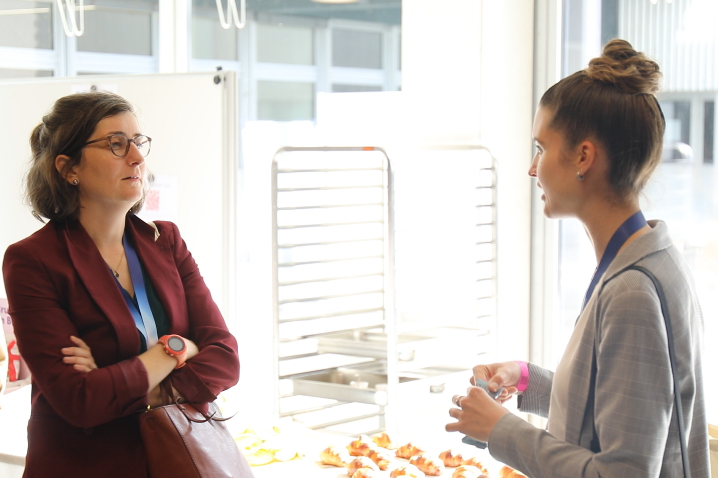 Emmanualle David in discussion with a attendee at #wetechtogether